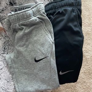 Boys Nike Dri-Fit sweatpants. Gray and black pair